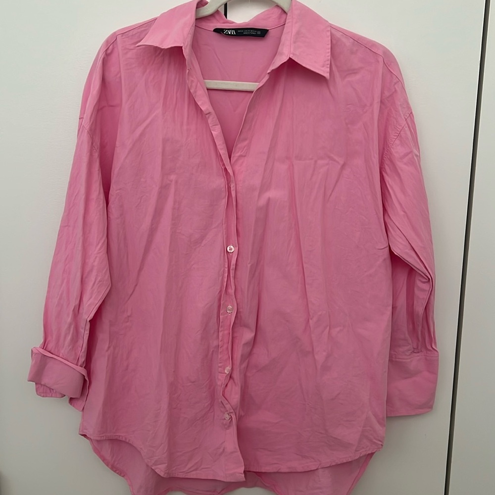 Pink button down shirt